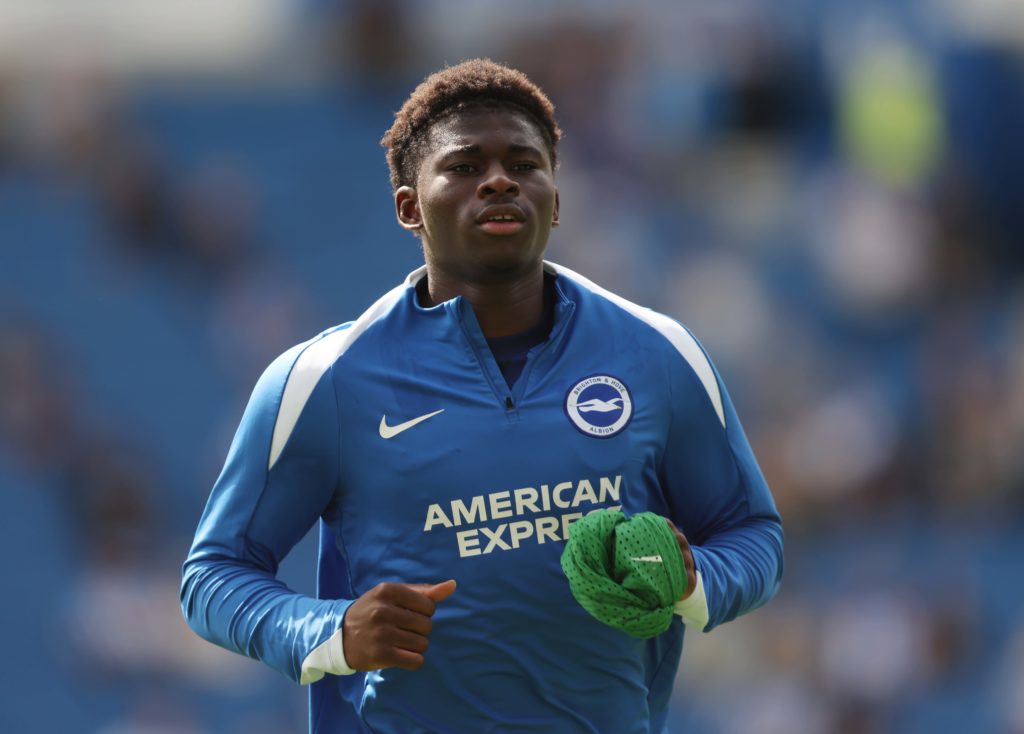 Carlos Baleba of Brighton & Hove Albion warms up ahead of the Premier League match between Brighton & Hove Albion and Manchester City at Amex Stadium.