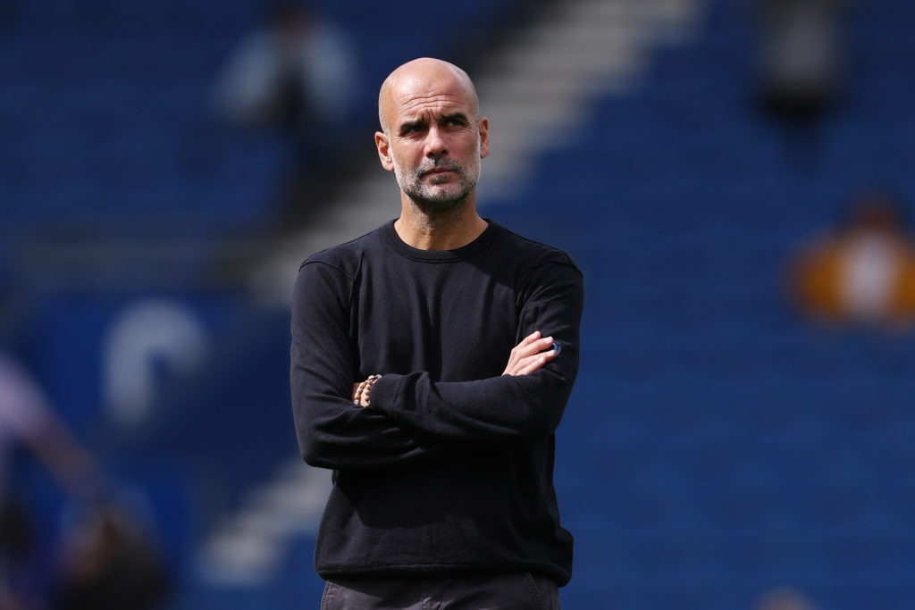 Pep Guardiola looks on before Brighton vs Manchester City in the Premier League