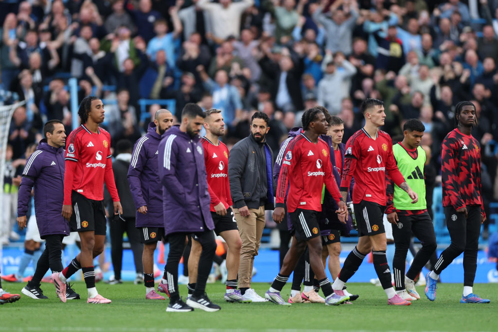 Ruben Amorim, Manager of Manchester United, looks dejected after the team's defeat during the Premier League match between Manchester City and Manchester United