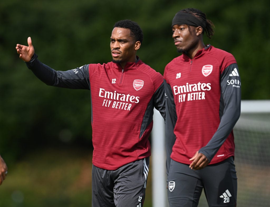 Jurrien Timber and Noni Madueke of Arsenal at Sobha Realty Training Centre on September 15, 2025 in London Colney, England.