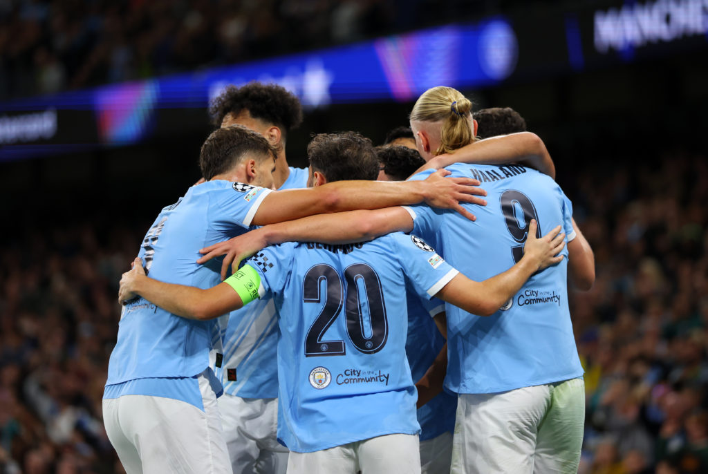 Manchester City players celebrate during a win over Napoli