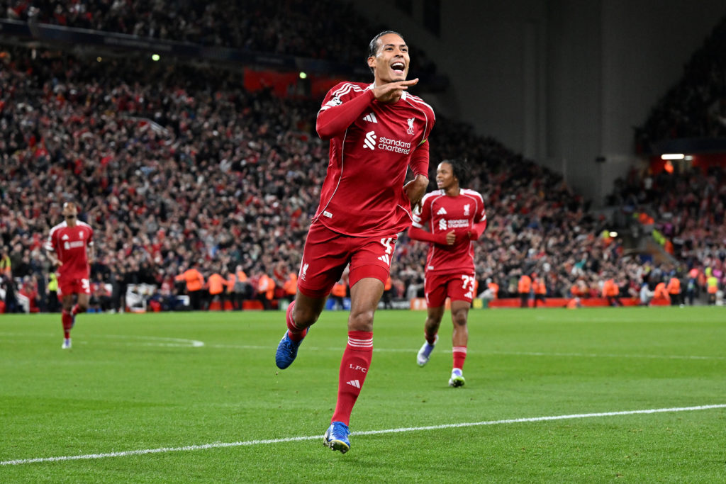 Virgil van Dijk celebrates scoring Liverpool's winning goal against Atletico Madrid in the Champions League