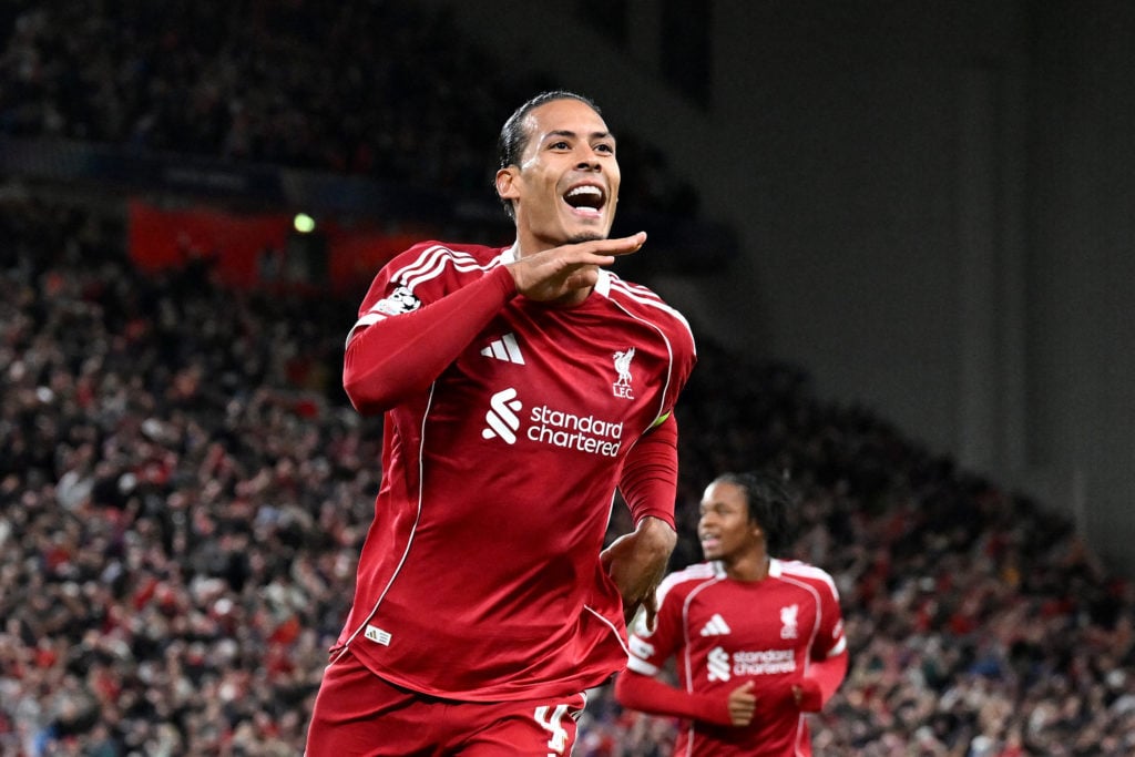 Virgil van Dijk of Liverpool celebrates scoring his team's third goal during the UEFA Champions League 2025/26 League Phase MD1 match between Liverpool FC and Atletico de Madrid at Anfield.