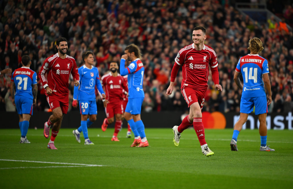 Andrew Robertson of Liverpool celebrates scoring his team's first goal during the UEFA Champions League 2025/26 League Phase MD1 match between Liverpool FC and Atletico de Madrid at Anfield.