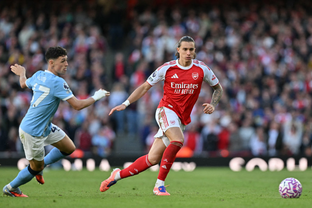 Riccardo Calafiori and Phil Foden during Arsenal vs Manchester City.