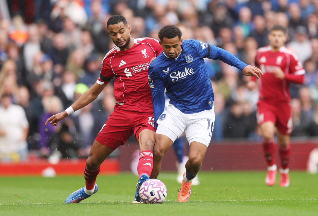 Cody Gakpo of Liverpool and Iliman Ndiaye of Everton battle for possession during the Premier League match between Liverpool and Everton at Anfield.