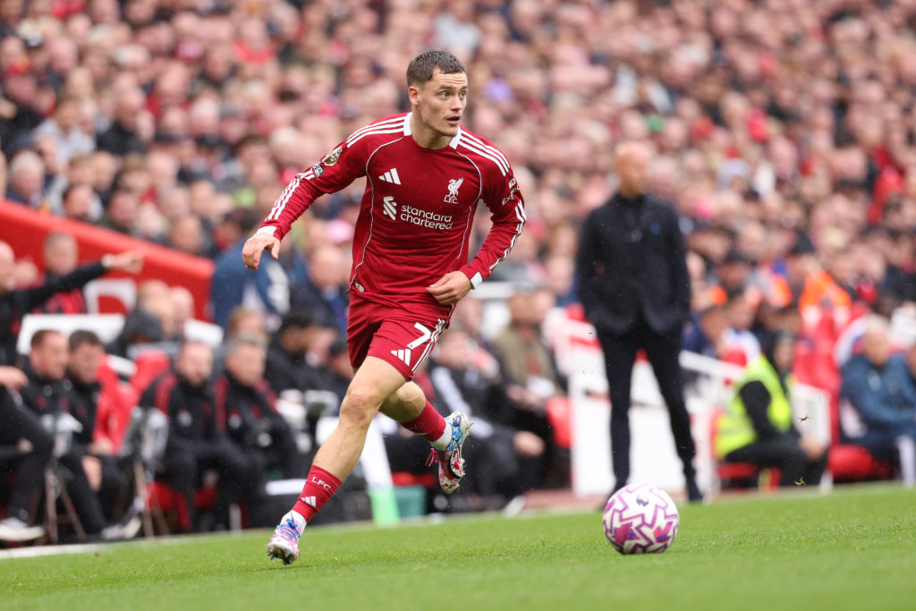 Florian Wirtz of Liverpool runs with the ball during the Premier League match between Liverpool and Everton