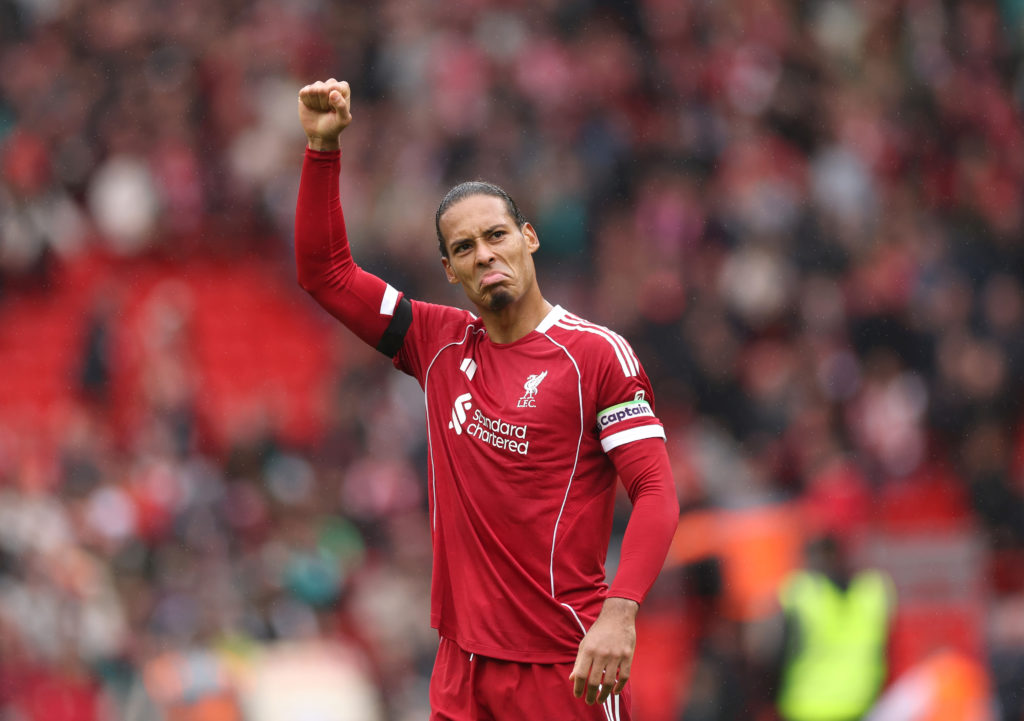 Virgil van Dijk celebrates after Liverpool's victory against Everton in the Premier League