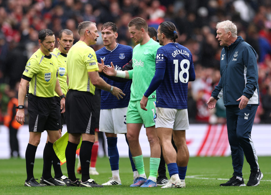 Everton manager David Moyes and players confront the match officials after the Premier League match between Liverpool and Everton