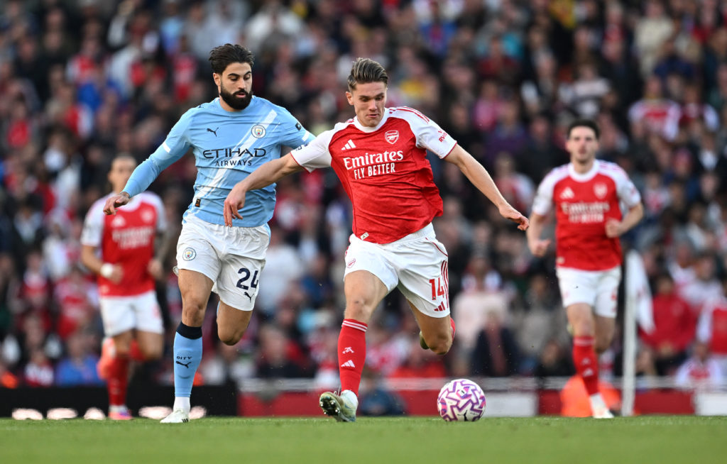 Arsenal's Viktor Gyokeres duels with Man City's Josko Gvardiol.