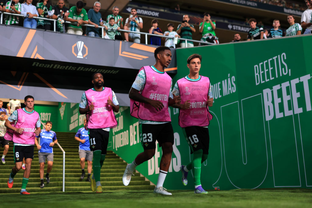 Real Betis players warm up before their match with Nottingham Forest