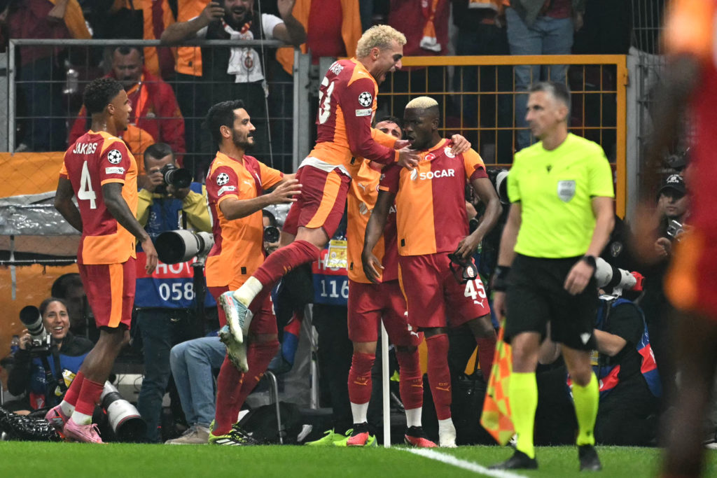 Victor Osimhen celebrates with his Galatasaray team-mates after scoring the winning goal against Liverpool