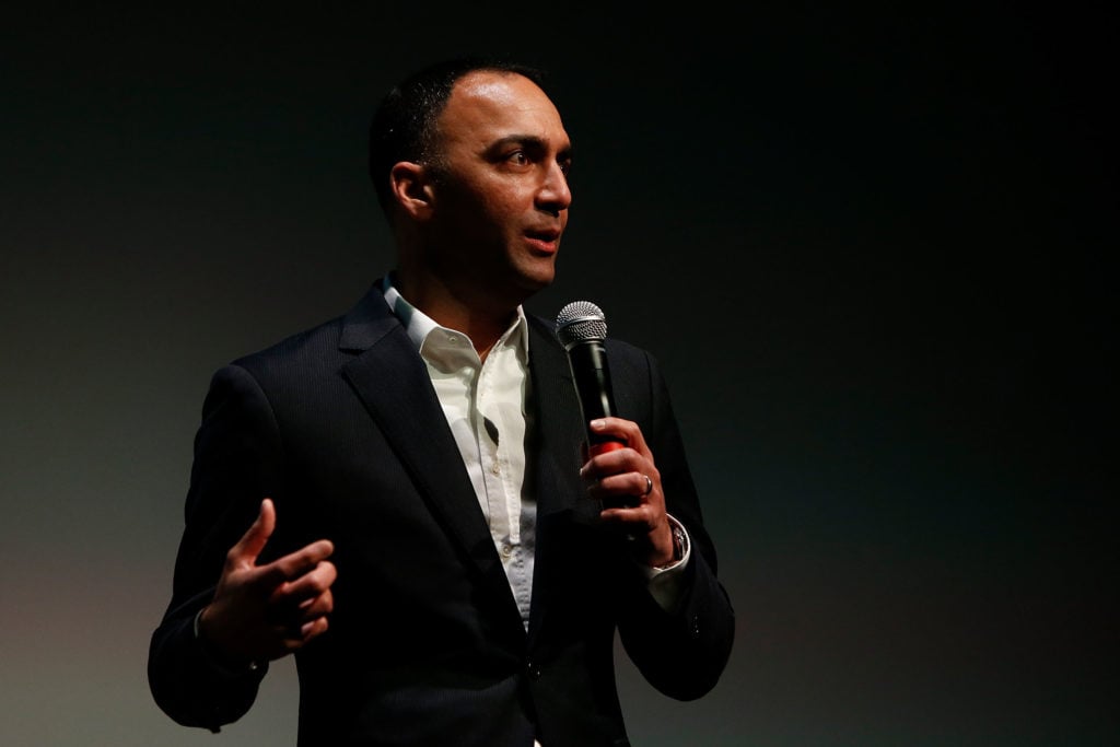 Leeds United chairman Paraag Marathe addresses a crowd in his role as president of 49ers Enterprises