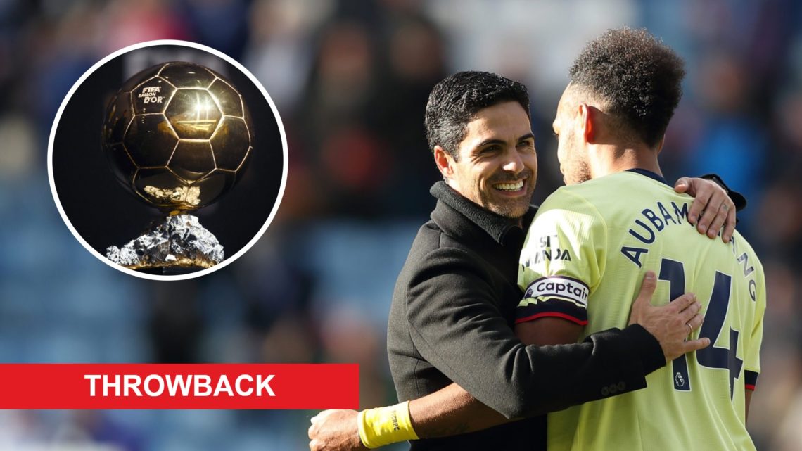 Pierre-Emerick Aubameyang embraces Arsenal manager Mikel Arteta alongside an image of the Ballon d'Or