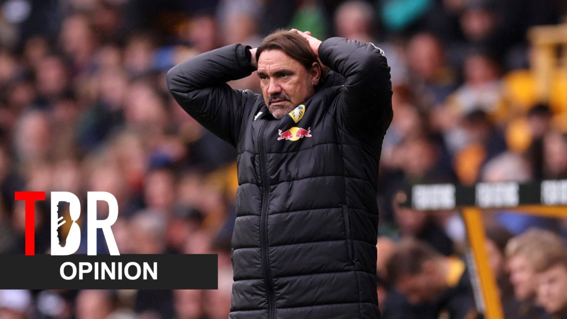 Daniel Farke reacts during a Leeds United match alongside an opinion banner and the TBR Football logo