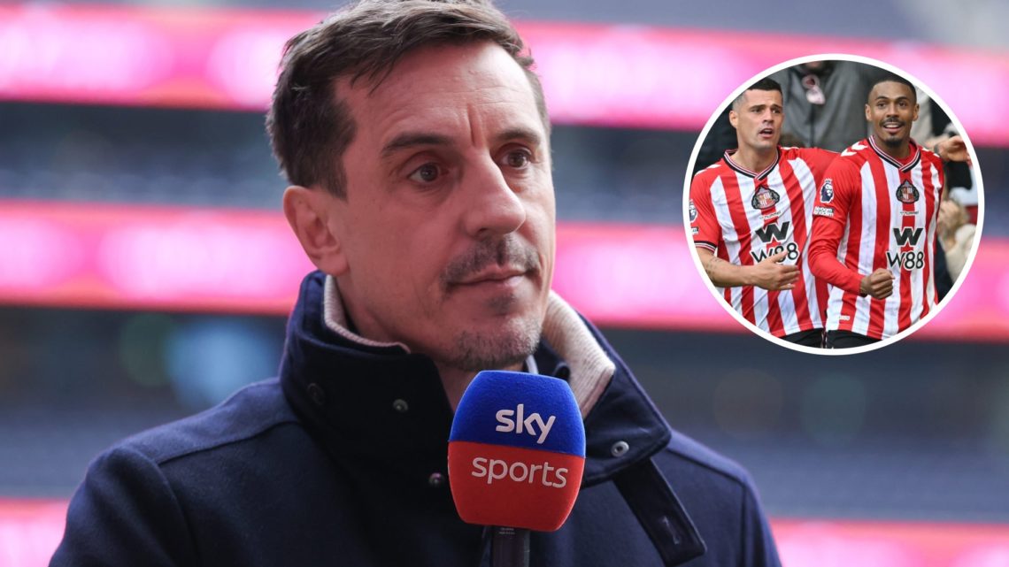 Gary Neville looks on during a Premier League game alongside Sunderland players celebrating