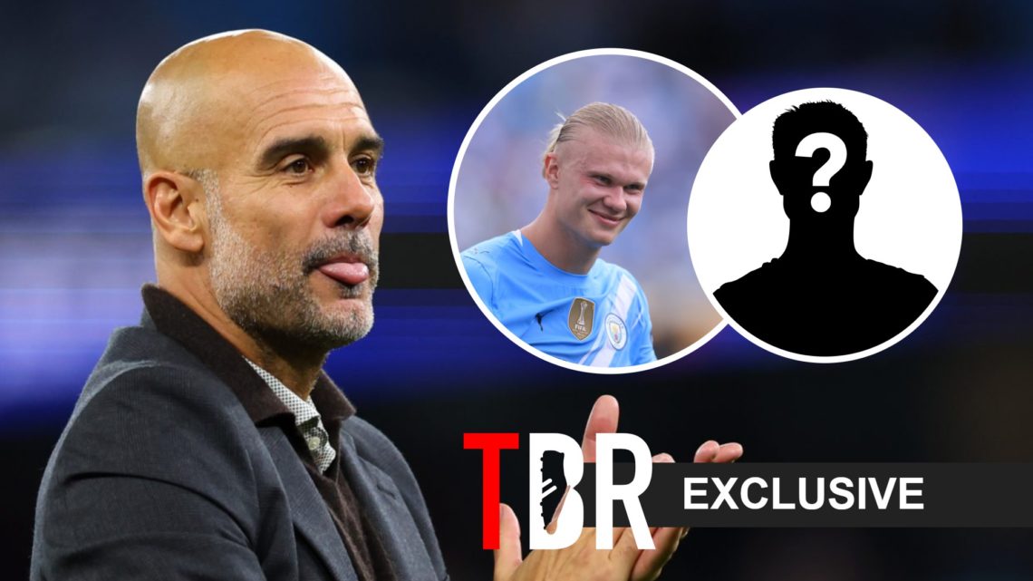 Manchester City boss Pep Guardiola alongside Erling Haaland.