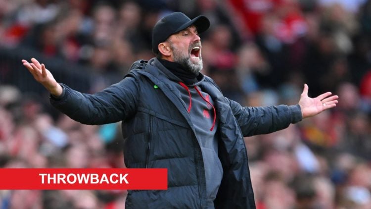 Jurgen Klopp gestures during a Liverpool game alongside a throwback banner