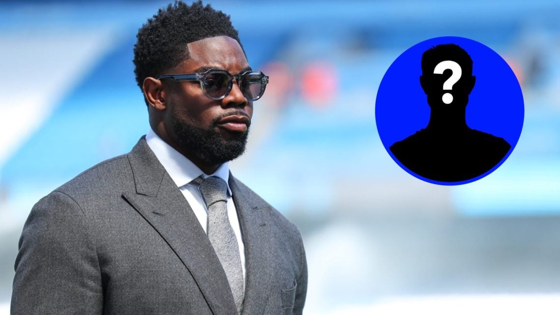 Micah Richards looks on before a Premier League match alongside a mystery player inset