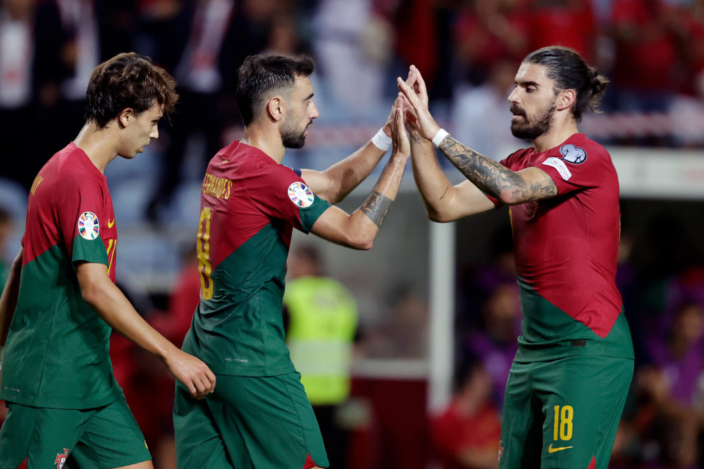 Bruno Fernandes of Portugal celebrates 8-0 with Ruben Neves of Portugal, Joao Felix of Portugal during the EURO Qualifier match between Portugal v Luxembourg