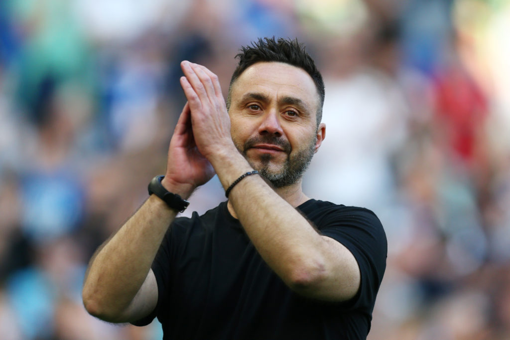 Roberto De Zerbi applauds the Brighton supporters after his final game in charge against Manchester United