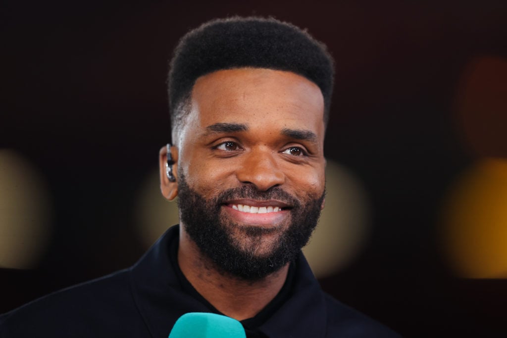ITV Sport pundit Darren Bent smiles during Nottingham Forest's FA Cup tie against Ipswich Town at the City Ground