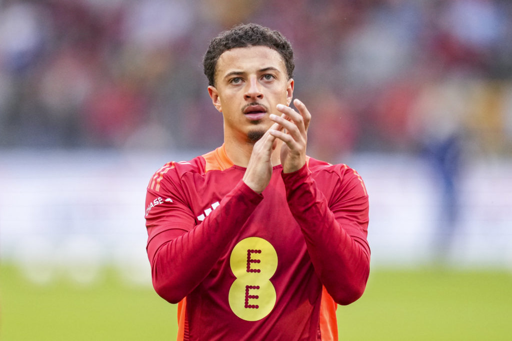 Ethan Ampadu applauds before the match between Wales and Belgium