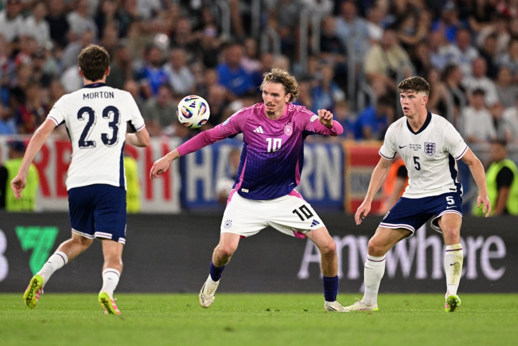 Germany striker Nick Woltemade looks on while under pressure from England defender Charlie Cresswell during the UEFA U-21 European Championship final