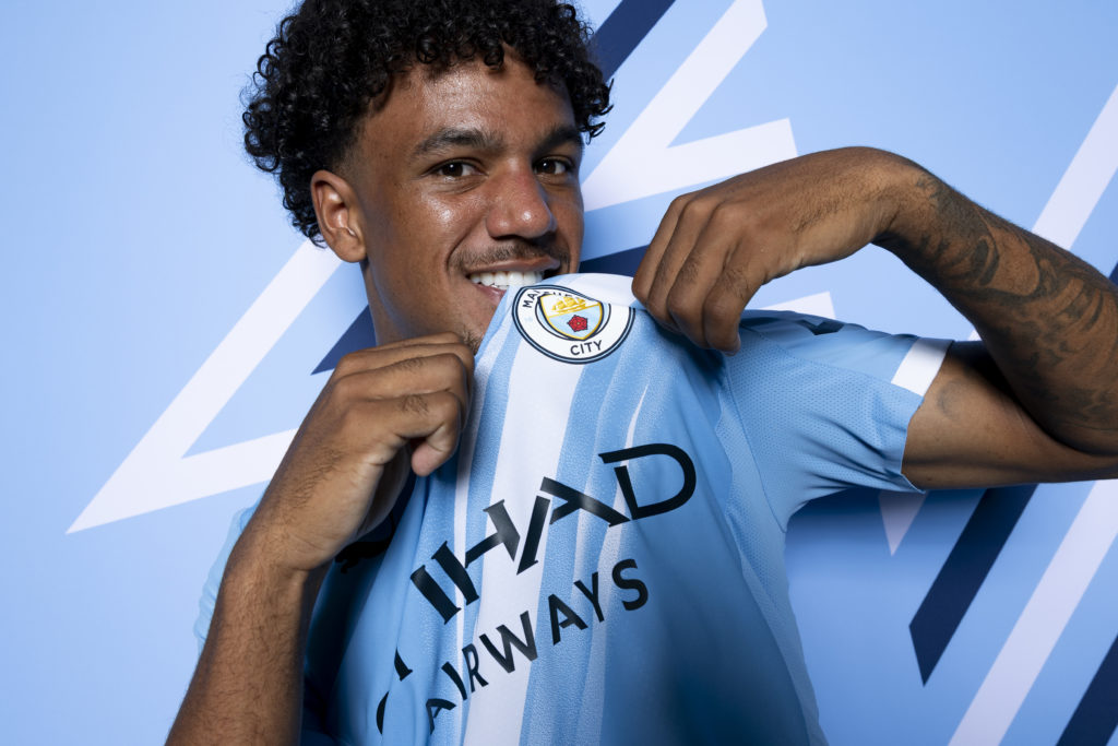 Oscar Bobb poses for a photo at Manchester City
