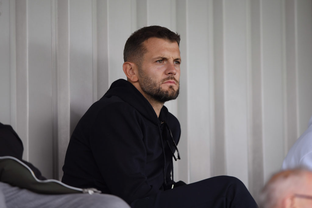 Jack Wilshere watches on during Arsenal under-21s vs Wolves under-21s