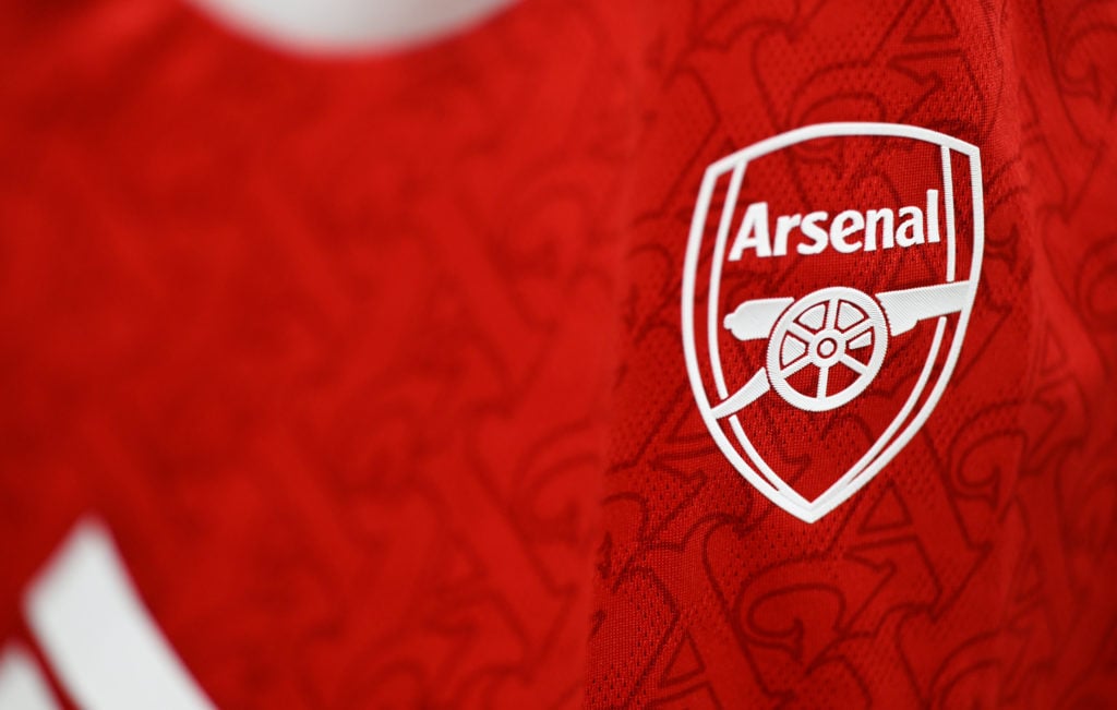 Closeup shot of the Arsenal badge on the club's 2025-26 home kit