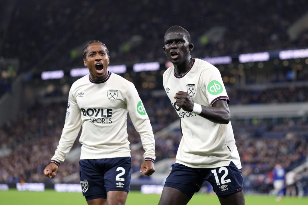 El Hadji Malick Diouf celebrates with Kyle Walker-Peters after West Ham's equaliser against Everton
