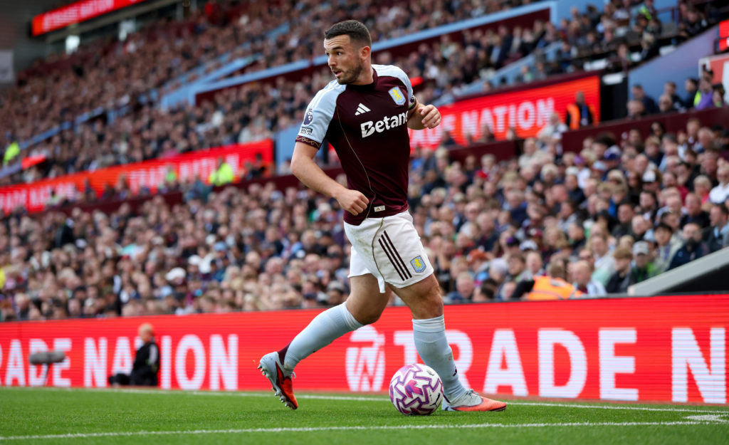 John McGinn with the ball during Aston Villa's Premier League match with Fulham