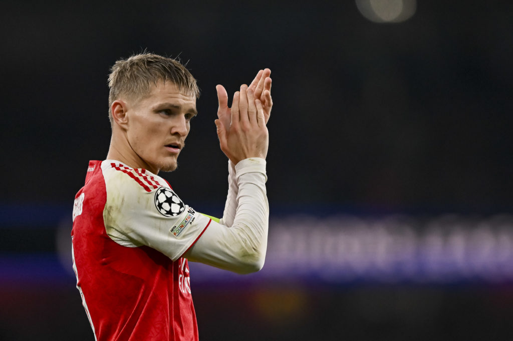 Arsenal captain Martin Odegaard applauds fans v Olympiacos FC