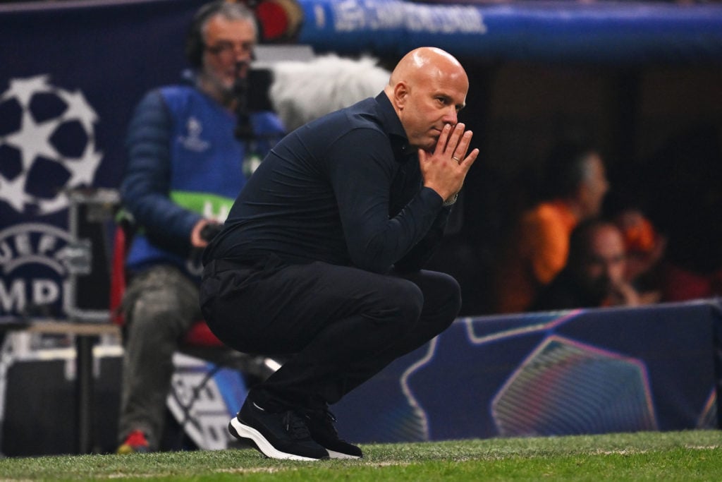 Liverpool head coach Arne Slot looks dejected on the touchline during his side's Champions League defeat against Galatasaray