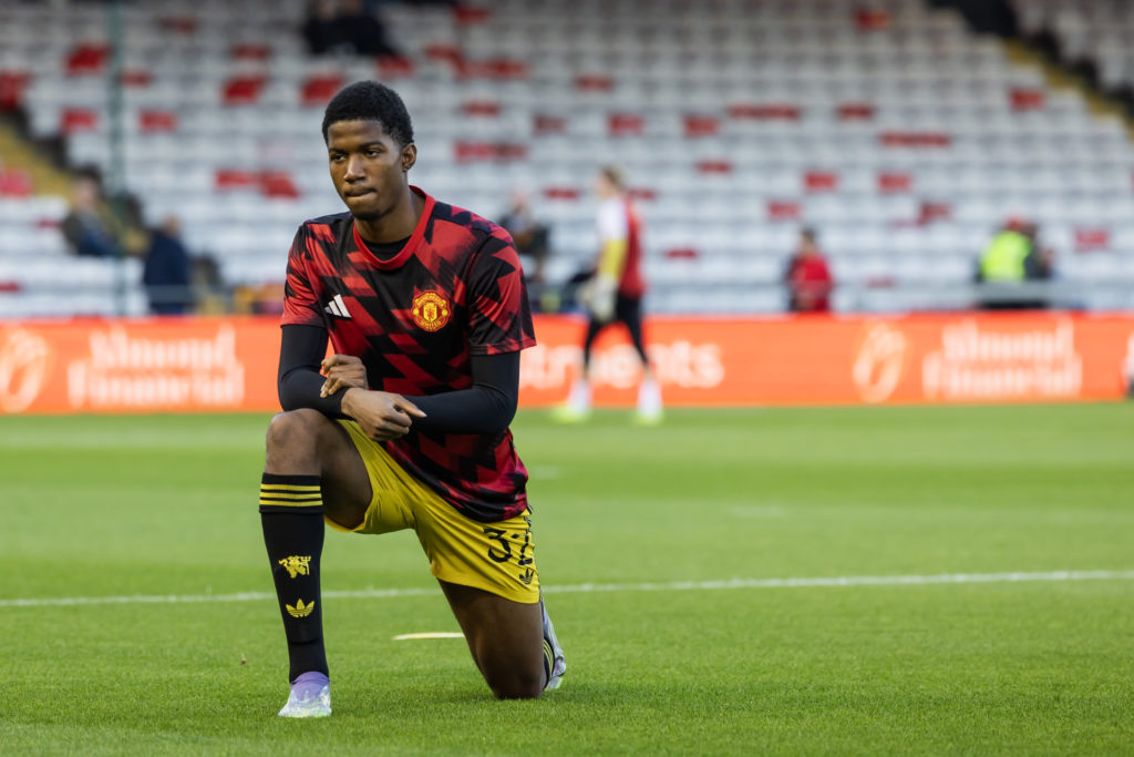 Chido Obi looks on before a Manchester United under-21s match