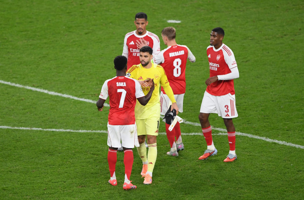 Arsenal players celebrate v Olympiacos