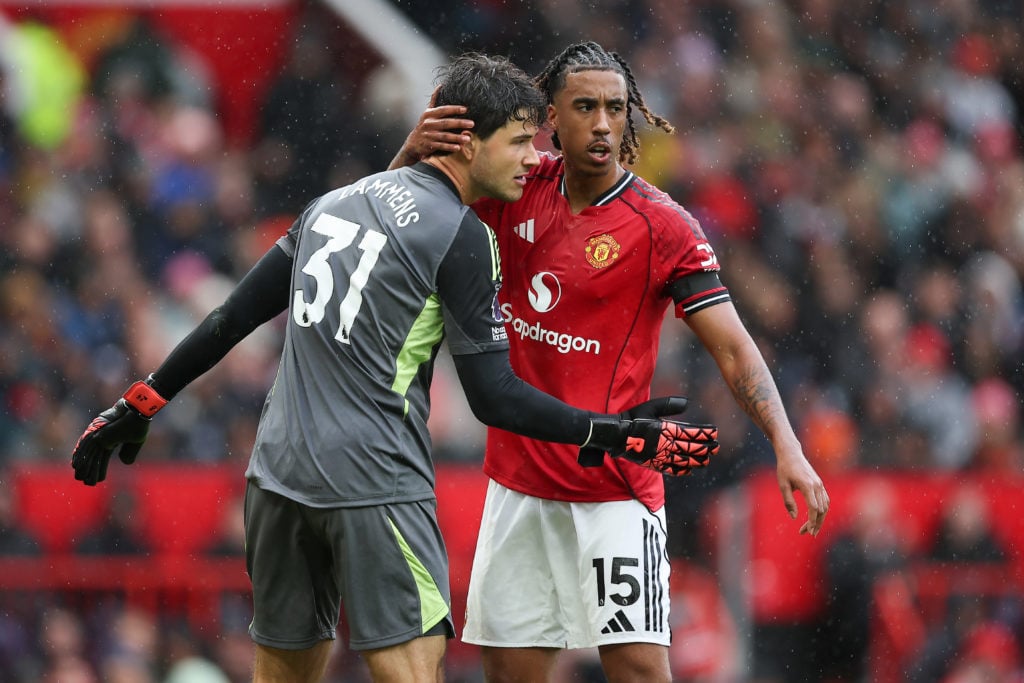 Leny Yoro congratulates Senne Lammens during Manchester United's win against Sunderland at Old Trafford
