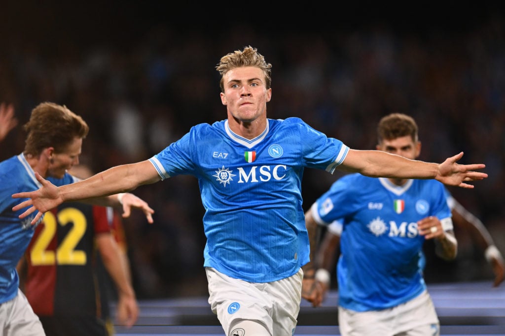 Rasmus Hojlund spreads his arms in celebration after scoring Napoli's winning goal against Genoa