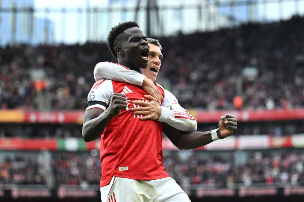 Bukayo Saka celebrates with Leandro Trossard after scoring for Arsenal against West Ham