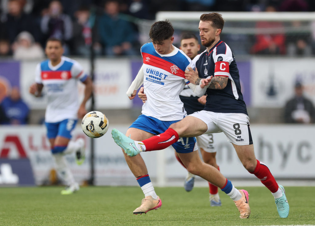 Mikey Moore battles for the ball in Falkirk vs Rangers