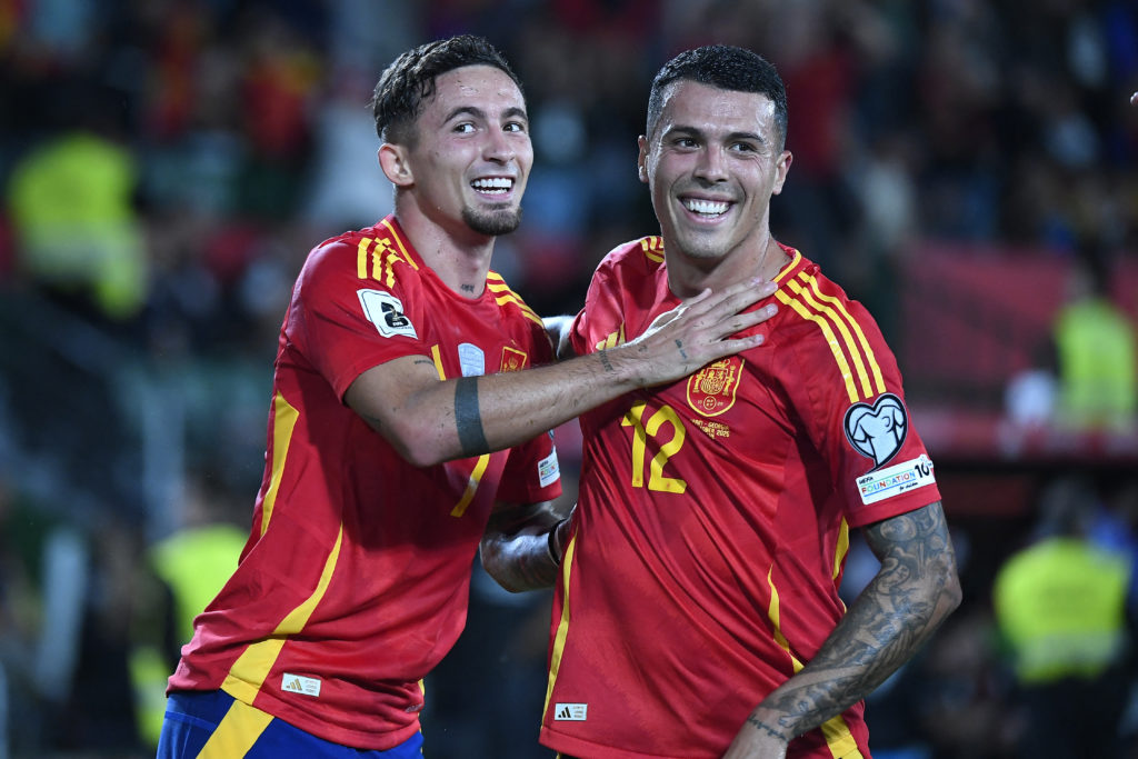 Pedro Porro celebrates with Yeremy Pino during Spain's win over Georgia