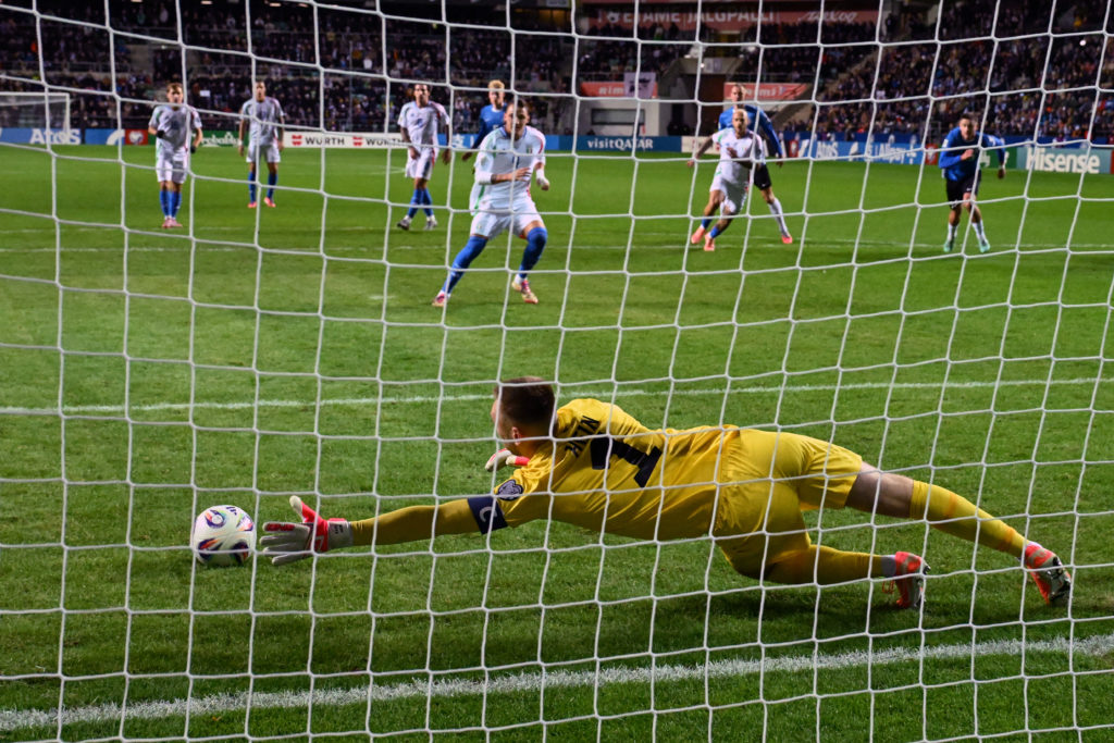 Karl Hein makes a save from the penalty spot for Estonia against Italy