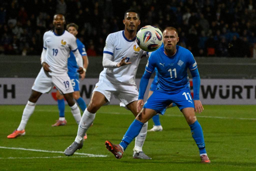 William Saliba battles for the ball during Iceland vs France