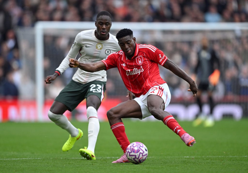 Taiwo Awoniyi of Nottingham Forest controls the ball whilst under pressure from Trevoh Chalobah of Chelsea during the Premier League match between Nottingham Forest and Chelsea at City Ground.
