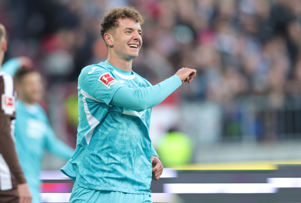 Fisnik Asllani of Hoffenheim celebrates scoring in the Bundesliga