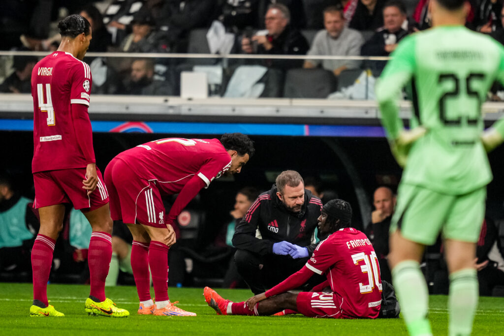 Jeremie Frimpong of Liverpool goes down with an injury