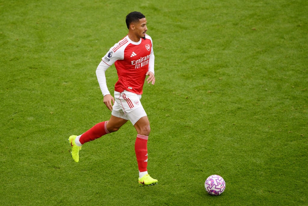 William Saliba of Arsenal runs with the ball during the Premier League match between Arsenal and Crystal Palace at Emirates Stadium