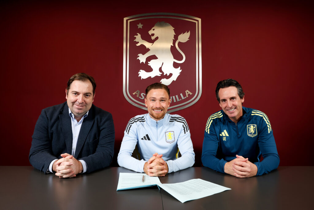 Matt Cash of Aston Villa poses for a picture with Damian Vidagany and Unai Emery