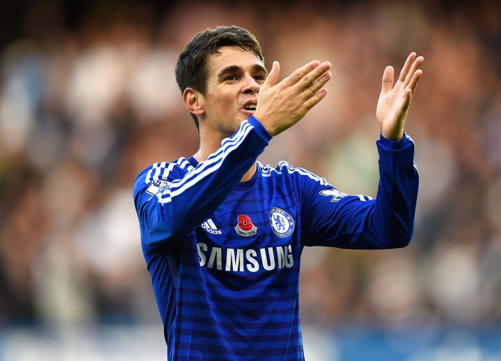 Oscar of Chelsea celebrates scoring the opening goal during the Barclays Premier League match between Chelsea and Queens Park Rangers at Stamford Bridge.